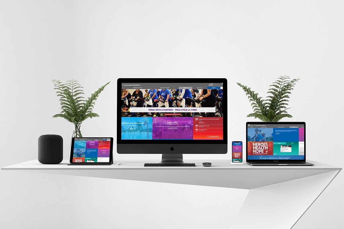 YMCA of Greater Indianapolis website presented across desktop, tablet, laptop, and mobile screens